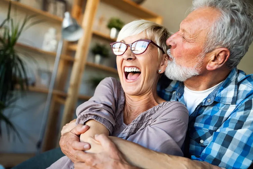 Older couple laughing together, RB Wealth retirement lifestyle Charlotte NC