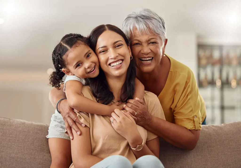 Grandmother hugging granddaughter, RB Wealth family financial planning Charlotte NC