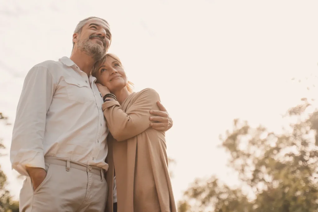 Senior couple embracing outdoors, RB Wealth retirement planning Charlotte NC